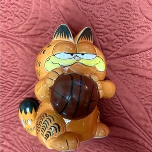 Garfield holding basketball ceramic piggy bank